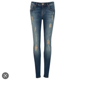 Ted Baker distressed skinny jeans.